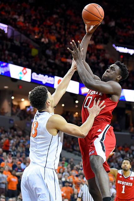 Freshman forward Abdul-Malik Abu takes a shot during the basketball game against No. 3 Virginia in Charlottesville, VA Wednesday, Jan. 7. The Cavaliers won out over the Wolfpack, 61-51.
