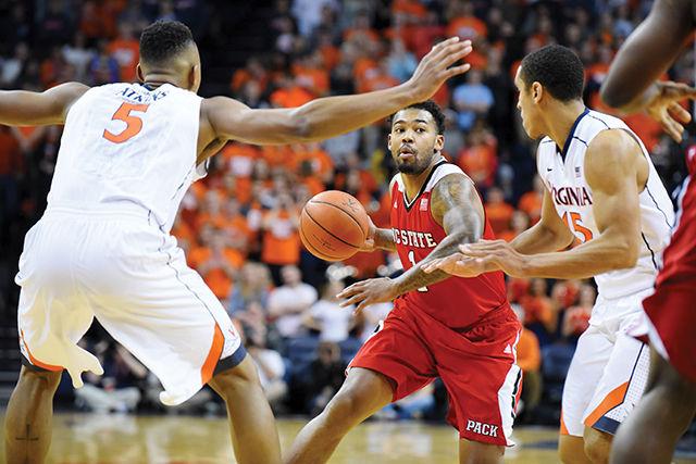 Redshirt junior guard Trevor Lacey drives to the basket during the basketball game against No. 3 Virginia in Charlottesville, VA Wednesday, Jan. 7, 2015. The Cavaliers won out over the Wolfpack, 61-51.