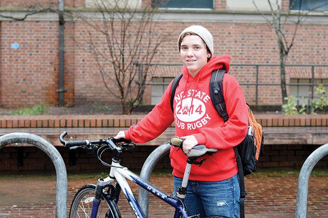Siobhan Cahill, a freshman studying sustainable materials &amp; technology, stands next to a bike in the bike rack in front of Broughton Hall. Cahill applied for and was accepted to participate in the 4K for Cancer, a program run by the Ulman Cancer Fund for Young Adults. Cahill is trying to raise $4500 not only because she wants to participate in a cross-country bike race but also because the Ulman Cancer Fund benefits young adults, particularly college-aged, facing cancer. "We look around a college campus and we think 'There's now way these kids could be facing cancer' but they are; everyone can be affected. This is real for kids our age, and we need to help" Cahill said.