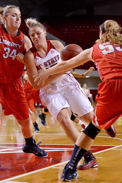 Junior forward Carlee Schuhmacher drives into the lane during NC State's game against Liberty Dec. 17 in Reynolds Coliseum. Schuhmacher led the Pack in scoring with 17 points. The Wolfpack narrowly defeated the Lady Flames 67-64.