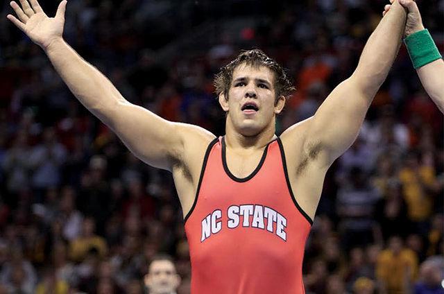 Redshirt sophomore Nick Gwiazdowski celebrates his triumphant match win over top-seeded Tony Nelson of Minnesota during the 2014 NCAA DI Natinoal Wrestling Championships. After achieving the 4-2 victory, the heavyweight became the sixth NC State wrestler to win a national championship.