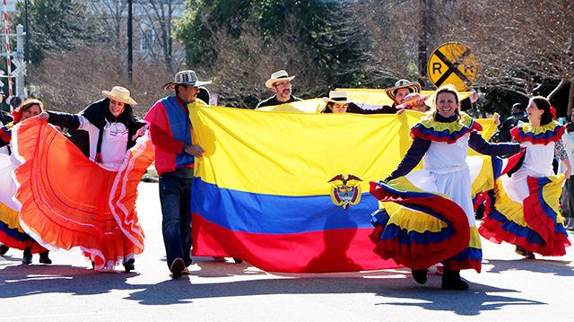 Ecuadorian culture group dances their way through the Three Kings Day parade on Saturday. It was the first time Ecuador was represented in the annual parade.
