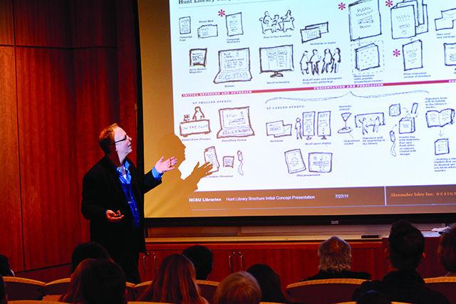 Award-winning designer and graduate of N.C. State's College of Design Alexander Isley shows his graphic design company Alexander Isley Inc.'s designs for the Hunt Library in one of the D.H. Hill Library's auditoriums on Thursday, Jan. 22, 2015. Isley gave a presentation discussing his experience with graphic design and featured his diverse portfolio of the work he and his company had done.
