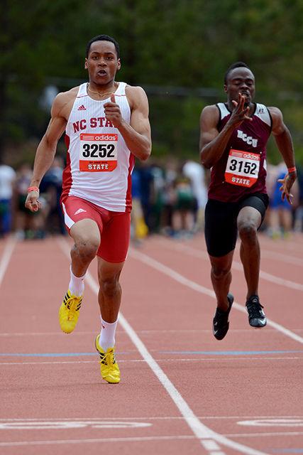 Junior sprinter Jonathan Addison flies toward the finish line of the 100m dash during the 2014 Raleigh Relays at Derr Track March 28.