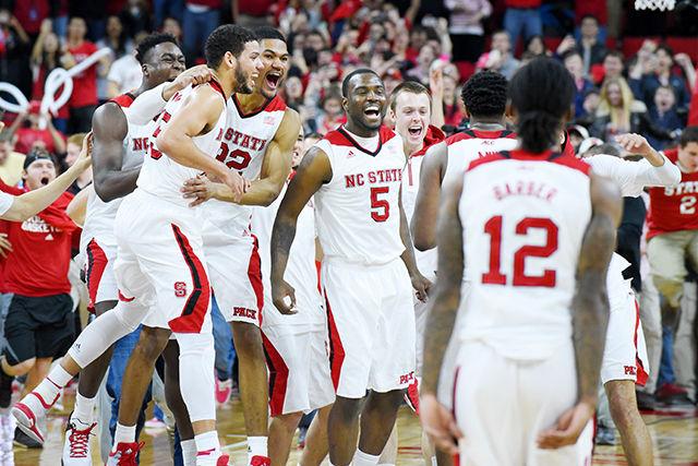 Freshman forward Cody Martin and sophomore forward Kyle Washington run to mid court after the basketball game against No. 2 Duke in PNC Arena Jan. 11. The Wolfpack defeated the Blue Devils, 87-75.