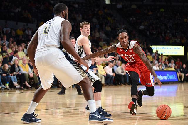 Sophomore guard Anthony &#8216;Cat&#8217; Barber drives to the basket during the basketball game against Georgia Tech in the McCamish Pavilion in Atlanta on Saturday. Barber led the Wolfpack to an 81-80 overtime victory over the Yellow Jackets, earning 23 points and going 4-5 from the three-point range.