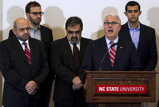 Surrounded by the family members of slain students Deah Barakat, Yusor Abu-Salha, and Razan Abu-Salha, Chancellor Randy Woodson announces the university's establishment of the "Our Three Winners" scholarship endowment fund Friday morning at the Roy Park Alumni Center. The endowment will provide annual financial support to NC State students studying in the Poole College of Management, College of Sciences, and College of Design.