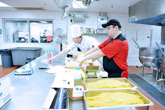 Food being prepared for dinner in the fountain dining hall kitchen. The dining hall kitchens use corn and potato starch to thicken dishes in order to better accommodate students with gluten allergies. N.C State University Dining has been named to FoodService Director Magazine's list of the fifteen healthiest food service operations in the country.