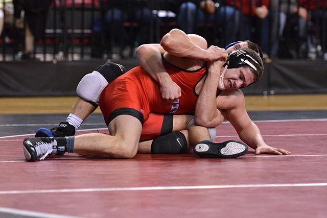 Freshman Nicky Hall wrestles Duke's Jacob Kasper during the 184-lb. weight class bout on Jan. 7 in Reynolds Coliseum.