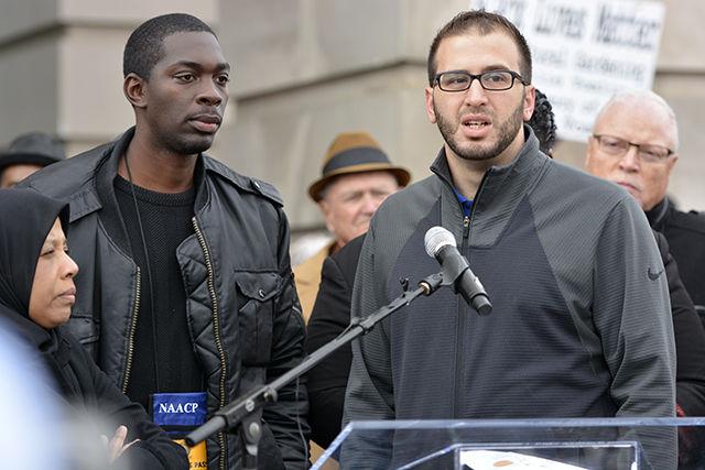 Pierre Lacy, the older brother of hanging victim Lennon Lacy, and Farris Barakat, the older brother of slain Muslim student Deah Barakat, speak outside of the Duke Energy Center for the Performing Arts at HKonJ in downtown Raleigh Saturday, Feb. 14. The annual rally attracted thousands of citizens from around the state who gathered to express their dissatisfaction with a number of policies surrounding topics such as reproductive rights, workers' conditions, GLBT equality, and religious freedom.
