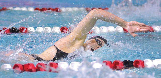 Sophomore Lotta Nevalainen takes a breath while swimming in the 200yd freestyle during NC State's meet with Minnesota Jan. 23 at the Casey Aquatic Center. Nevalainen finished the event with a time of 1:51.55 and was a member of the first-place finishing 400yd freestyle relay team. Both the No. 8 men's (201-127) and No. 16 women's teams (189-145) recorded victories over the Golden Gophers.