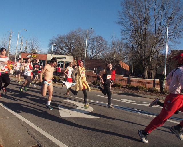 The Krispy Kreme Challenge, which has racers run from the Bell Tower to Krispy Kreme eat a dozen glazed donuts, and run back, took place on Saturday, Feb. 14, 2015. An N.C. State student in the intensive English program, Ghassan Al-Hadhrami, won the race with a time of 28 minutes and 50 seconds.