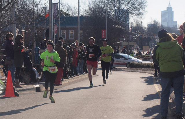 The Krispy Kreme Challenge, which has racers run from the Bell Tower to Krispy Kreme eat a dozen glazed donuts, and run back, took place on Saturday, Feb. 14, 2015. An N.C. State student in the intensive English program, Ghassan Al-Hadhrami, won the race with a time of 28 minutes and 50 seconds.
