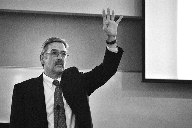 Bill Corcoran, president and CEO of American Near East Refugee Aid, speaks at the Shattered Families in the Middle East event in Withers Hall on Monday night. The relief agency provides aid primarily to refugees in West Bank, Gaza, Lebanon and Jordan.