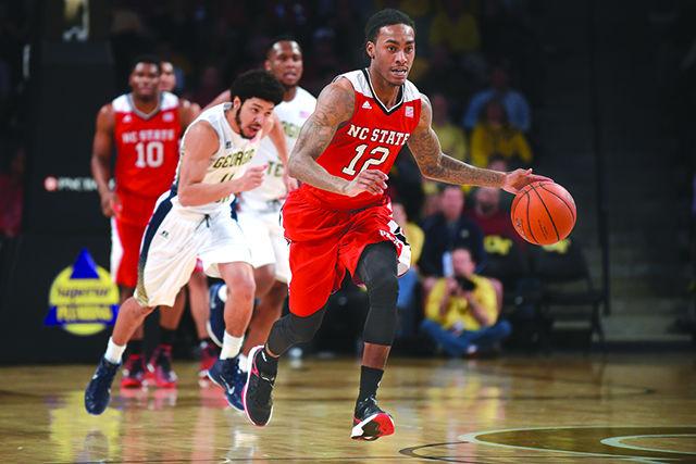Sophomore guard Anthony &#8220;Cat&#8221; Barber breaks away in transition during the basketball game against Georgia Tech in the McCamish Pavilion in Atlanta on Saturday. Barber led the Wolfpack to an 81-80 overtime victory over the Yellow Jackets, earning 23 points and going 4-5 from three-point range.