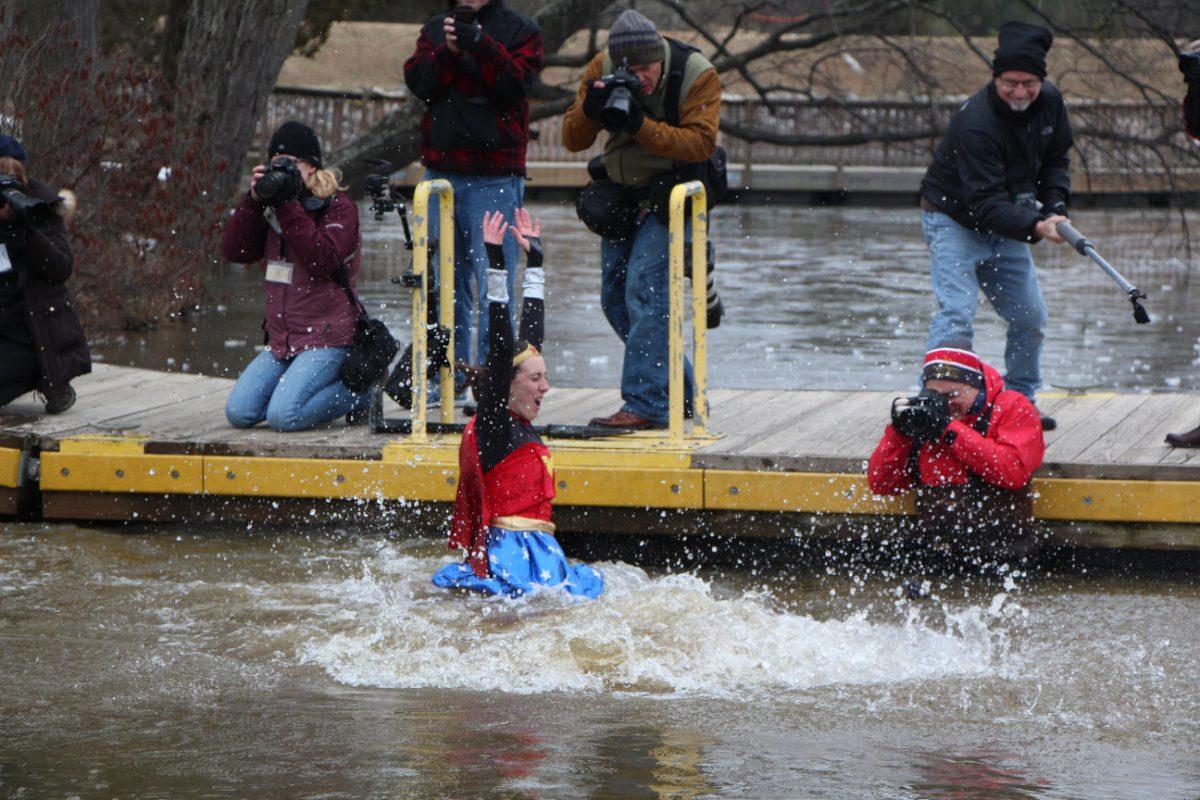 Dozens of "plungers" braved the icy waters og Lake Raleigh Saturday morning, Feb. 21, 2015 for the 2015 Polar Plunge. The annual event is hosted to raise funds for Special Olympics North Carolina. This year's groups raised more than $14,000 for the cause.