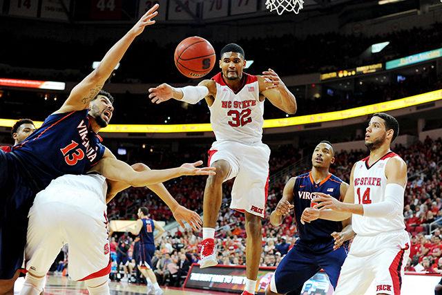Sophomore forward Kyle Washington dives for a rebound during the game against No. 2 Virginia Wednesday. Washington had seven points in the Wolfpack&#8217;s 51-47 loss to the Cavaliers at PNC Arena.&#160;
