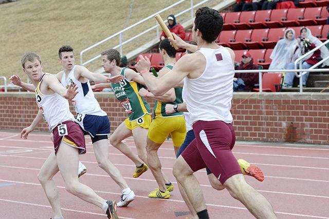 Participants of Men 1600 Sprint Medley get geared up to receive the relay baton from their fellow teammates. Various universities from across the country participate in Raleigh Relays, an annual event hosted by NC State. This event took place at Dail Soccer field on 27th March, 2015.