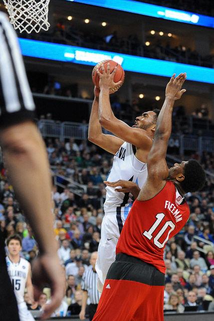 N.C. State defeats 1 seed Villanova in the third round of the NCAA Men's Basketball Tournament in Pittsburgh, PA Saturday, Mar. 21, 2015. The Wolfpack will face the winner of Louisville vs Northern Iowa in their Sweet Sixteen matchup in Syracuse, NY.