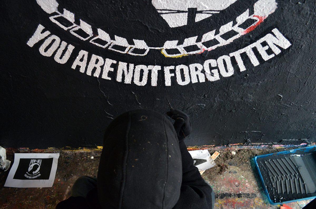 Students who were attempting to join the Arnold Air Society went through initiation which included a mural in the free expression tunnel.