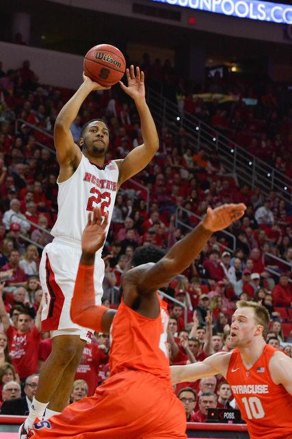 The N.C. State men's basketball team defeated the Syracuse Orange Saturday, March 7, 2015 at PNC Arena 71-57. With the win against the Orange the Wolfpack clenched a number 7 seed in the ACC tournament.