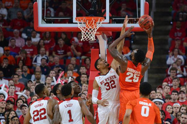 The N.C. State men's basketball team defeated the Syracuse Orange Saturday, March 7, 2015 at PNC Arena 71-57. With the win against the Orange the Wolfpack clenched a number 7 seed in the ACC tournament.