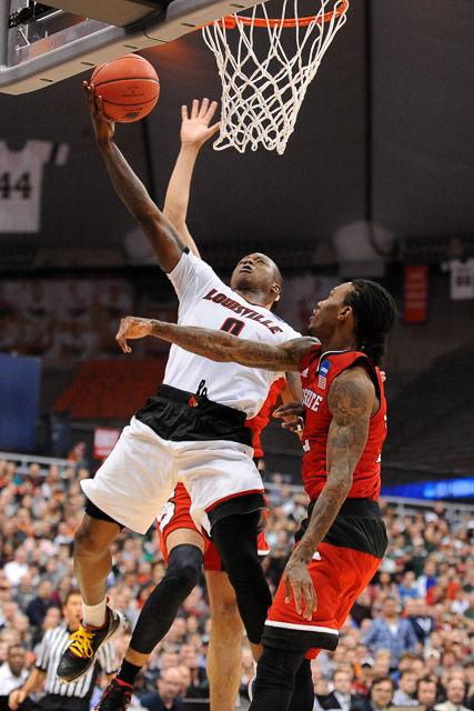 N.C. State falls to Louisville 75-65 in the Sweet Sixteen in Syracuse Friday, March 25, 2013.
