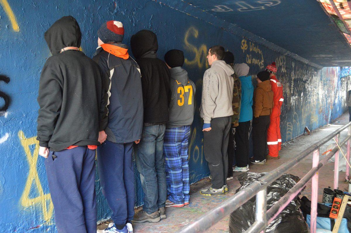 Students who were attempting to join the Arnold Air Society went through initiation which included a mural in the free expression tunnel.