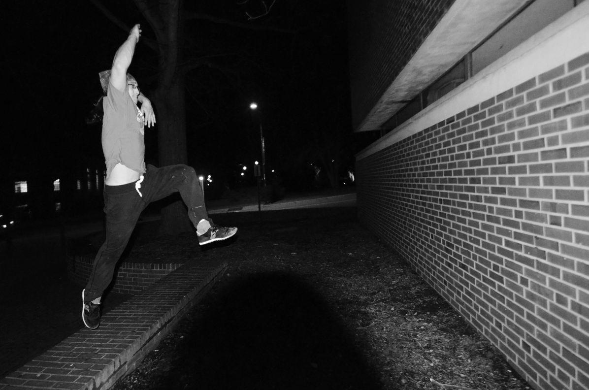 Thomas Podbedck, a senior in Material Sceince Engineering, leaps toward a wall so he can cat hang on March 4th. Podbesck is a senior officer in the freerun and Parkour club at State. "I enjoy the movement the most" said Podbesek as he described his passion for freerunning.