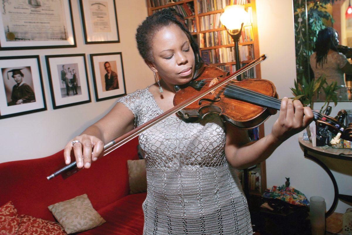 Regina Carter, a 2006 recipient of the MacArthur Foundation &#8220;Genius grant and jazz virtuoso, poses for a picture in September 2006 in her apartment in New York City.&#160;