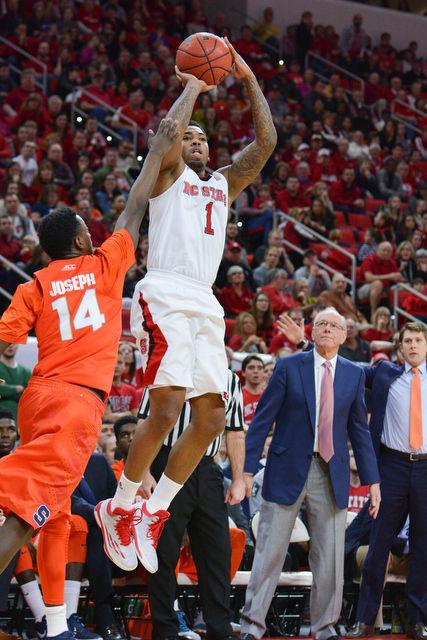 The N.C. State men's basketball team defeated the Syracuse Orange Saturday, March 7, 2015 at PNC Arena 71-57. With the win against the Orange the Wolfpack clenched a number 7 seed in the ACC tournament.