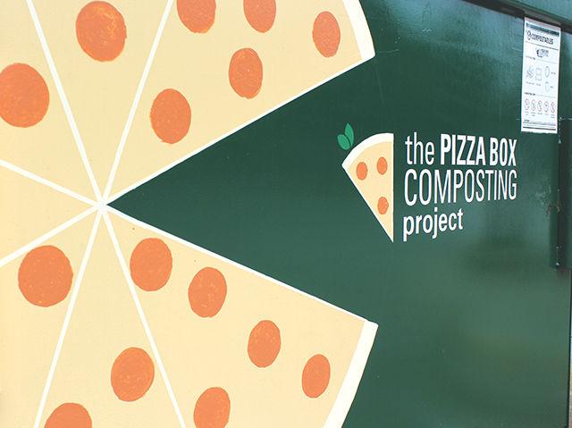 NC State's Waste Reduction and Recycling Office, along with University Housing has collaborated to form The Pizza Box Composting Project. These dumpsters can be found outside of the dorms and apartments on campus. Photo by Keenan Hairston
