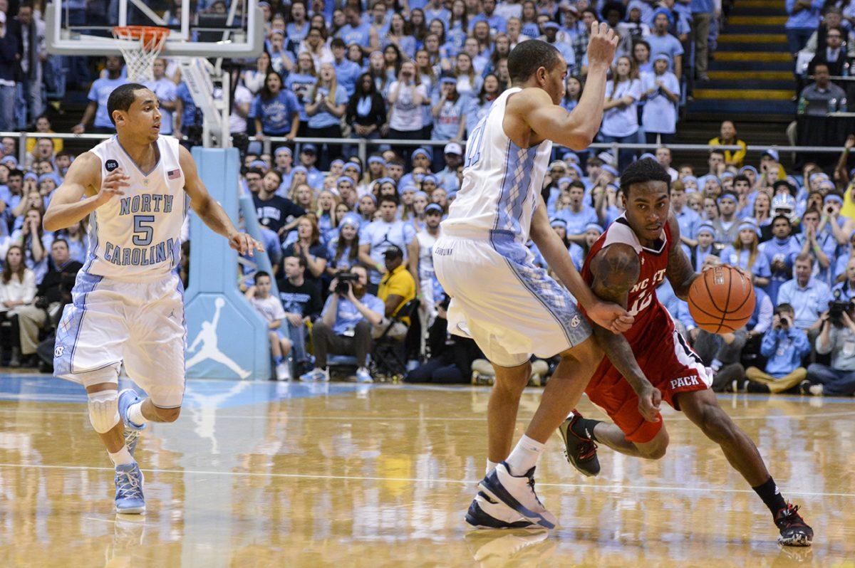 The NC State men's basketball team topped No. 15 rival UNC-Chapel Hill 58-46 in Chapel Hill Tuesday, Feb. 24, 2015, holding the Tar Heels to their lowest game total in Dean Dome history. The win marks the Wolfpack's first at UNC since 2003, and its first over a Roy Williams-led Tar Heel squad. Sophomore guard Anthony 'Cat' Barber led the Pack in scoring with fifteen points, and sophomore forward BeeJay Anya was a huge defensive presence with six blocks, six rebounds, and a steal. The Pack's next game is scheduled for Saturday against Boston College in Chestnut Hill.