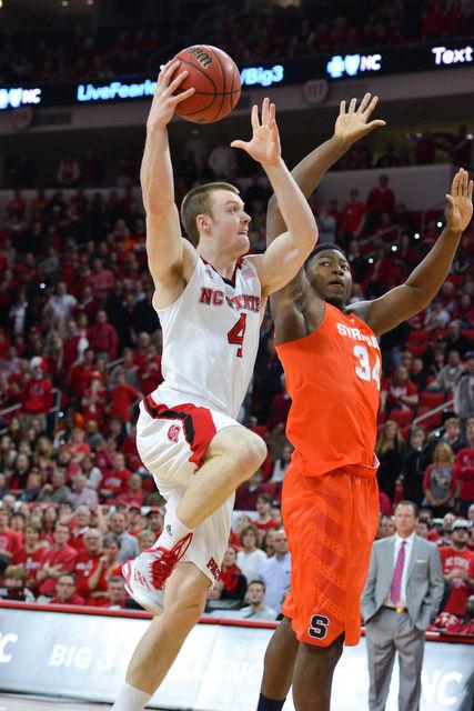 The N.C. State men's basketball team defeated the Syracuse Orange Saturday, March 7, 2015 at PNC Arena 71-57. With the win against the Orange the Wolfpack clenched a number 7 seed in the ACC tournament.