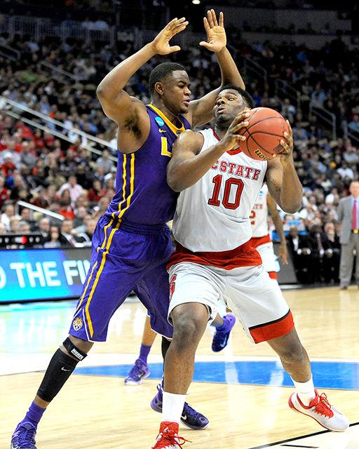 Sophomore forward Lennard Freeman turns to shoot a layup during the 2nd round game of the NCAA Tournament against LSU Thursday, March 19, 2015. Freeman had four points in the Wolfpack's 66-65 win over the Tigers at CONSOL Engergy Center in Pittsburgh, PA.