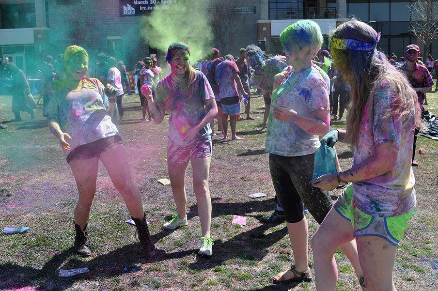 Students covered each other in colors to celebrate spring during Holi March 21, 2014 on Harris Field. This year's Holi celebration will take place Saturday from 12pm to 4pm on Lee Field.