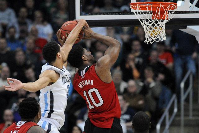 N.C. State defeats 1 seed Villanova in the third round of the NCAA Men's Basketball Tournament in Pittsburgh, PA Saturday, Mar. 21, 2015. The Wolfpack will face the winner of Louisville vs Northern Iowa in their Sweet Sixteen matchup in Syracuse, NY.