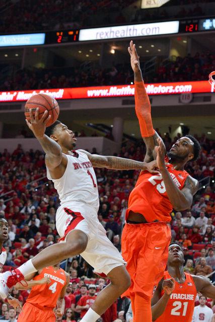 The N.C. State men's basketball team defeated the Syracuse Orange Saturday, March 7, 2015 at PNC Arena 71-57. With the win against the Orange the Wolfpack clenched a number 7 seed in the ACC tournament.