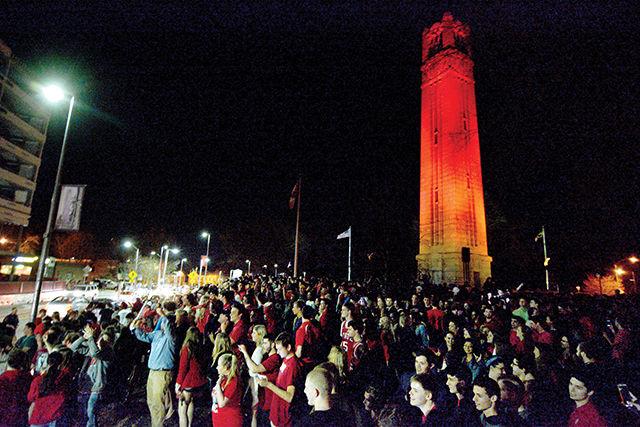 N.C. State fans gather at the Belltower Saturday March 22, 2015 to celebrate the men's basketball team's victory over number 1 ranked Villanova. The Wolfpack defeated the Wildcats 71-68. Photo by Chris Rupert.