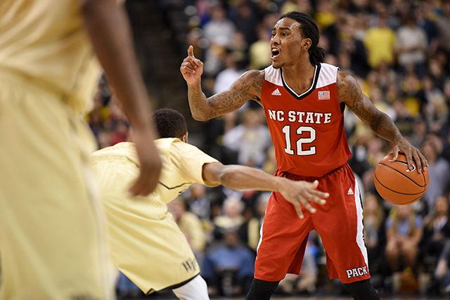 Sophomore guard Anthony &#8216;Cat&#8217; Barber&#160; calls a play to his teammates during the men&#8217;s basketball game at Wake Forest Feb. 3. The Demon Deacons dominated the Wolfpack in the first half, leading 51-30 at halftime. The Wolfpack mounted an unsuccessful comeback attempt, finishing the game with an 88-84 loss. The loss brought the Wolfpack to 14-10 overall and 5-6 in the ACC.