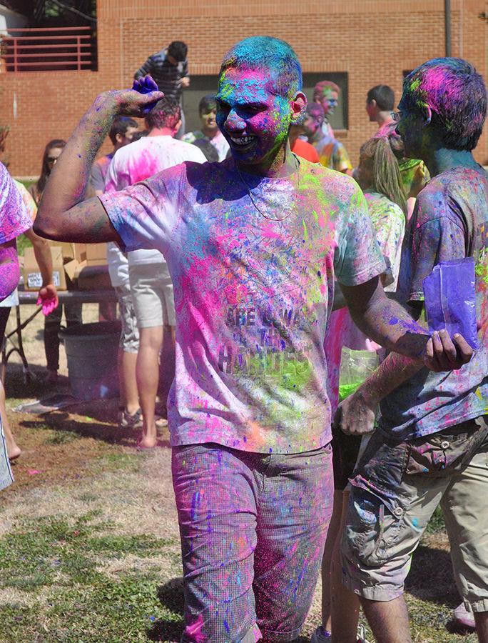 Students covered each other in colors to celebrate spring during Holi March 21, 2014 on Harris Field. This year's Holi celebration will take place Saturday from 12pm to 4pm on Lee Field.