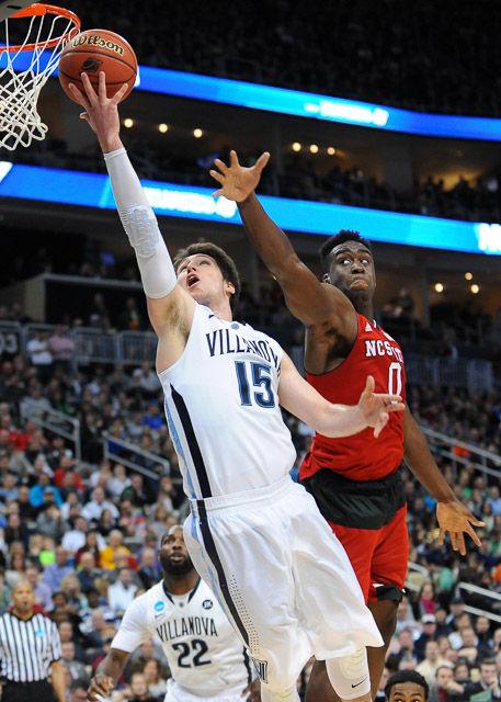 N.C. State defeats 1 seed Villanova in the third round of the NCAA Men's Basketball Tournament in Pittsburgh, PA Saturday, Mar. 21, 2015. The Wolfpack will face the winner of Louisville vs Northern Iowa in their Sweet Sixteen matchup in Syracuse, NY.