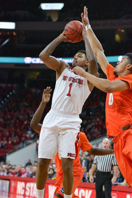 The N.C. State men's basketball team defeated the Syracuse Orange Saturday, March 7, 2015 at PNC Arena 71-57. With the win against the Orange the Wolfpack clenched a number 7 seed in the ACC tournament.