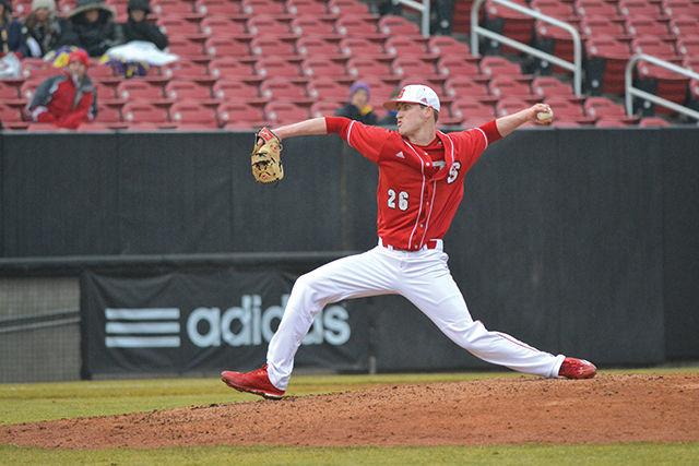 Junior Brad Stone pitches in the baseball game played on Tuesday, Feb. 3 on Doak Field at 3 pm. The Wolfpack won 7-0 against East Carolina University.