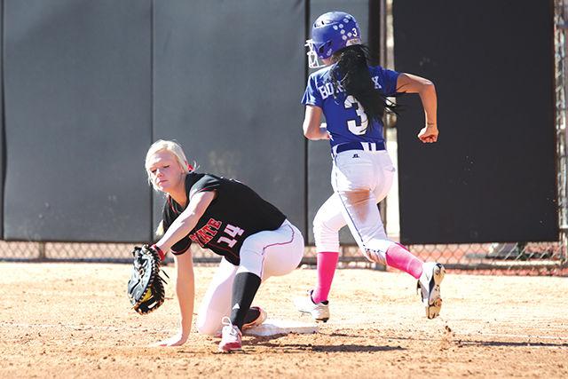 Freshman first baseman Meredith Burroughs tags the base for an out. The Wolpack beat Pitt Community 3-1 during the first game of a double header on October 25th, 2015.