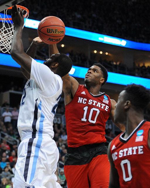 N.C. State defeats 1 seed Villanova in the third round of the NCAA Men's Basketball Tournament in Pittsburgh, PA Saturday, Mar. 21, 2015. The Wolfpack will face the winner of Louisville vs Northern Iowa in their Sweet Sixteen matchup in Syracuse, NY.