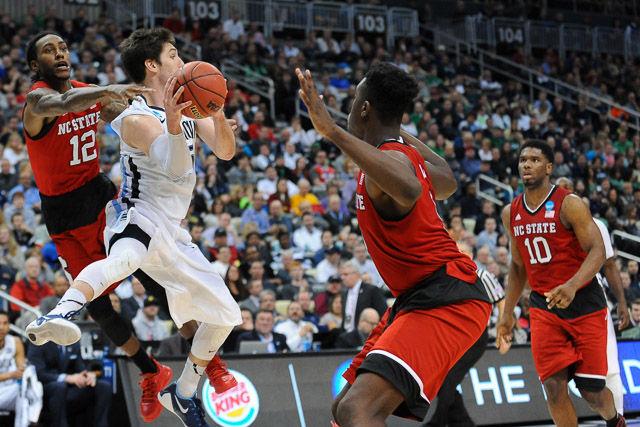 N.C. State defeats 1 seed Villanova in the third round of the NCAA Men's Basketball Tournament in Pittsburgh, PA Saturday, Mar. 21, 2015. The Wolfpack will face the winner of Louisville vs Northern Iowa in their Sweet Sixteen matchup in Syracuse, NY.