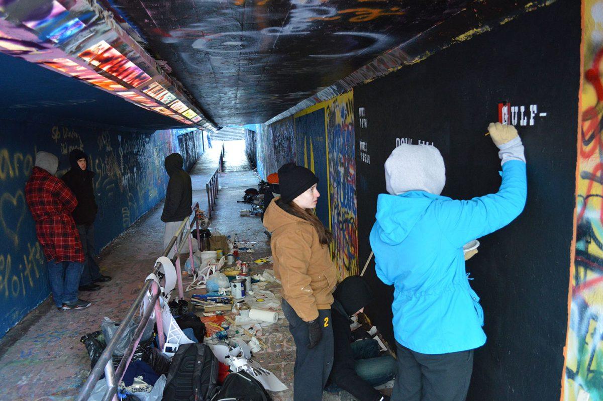 Students who were attempting to join the Arnold Air Society went through initiation which included a mural in the free expression tunnel.