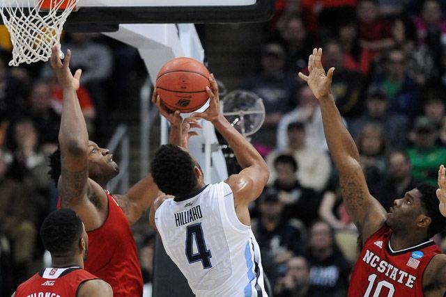 N.C. State defeats 1 seed Villanova in the third round of the NCAA Men's Basketball Tournament in Pittsburgh, PA Saturday, Mar. 21, 2015. The Wolfpack will face the winner of Louisville vs Northern Iowa in their Sweet Sixteen matchup in Syracuse, NY.