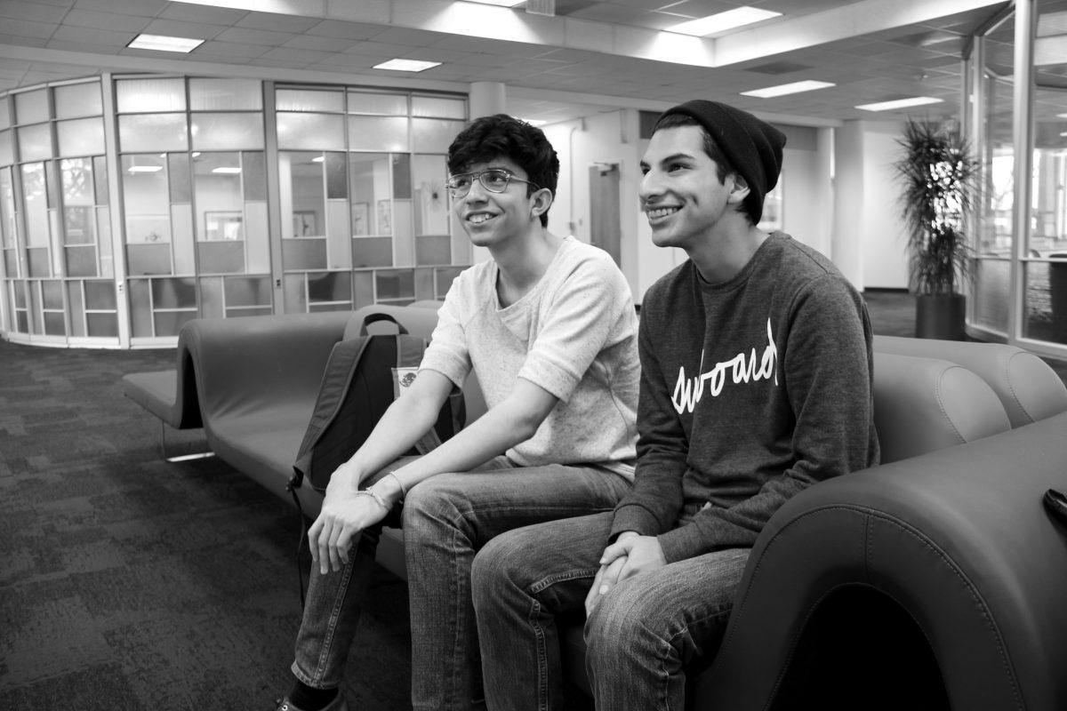 Jorge Luis Ramos Ramos, left, and Jorge Luis Acosta Solis sit and talk with a friend on February 1, 2015. Ramos Ramos and Acasto Solis don't let their immigration status define them, instead finding strength through advocacy projects in their communities that help other undocumented immigrants.